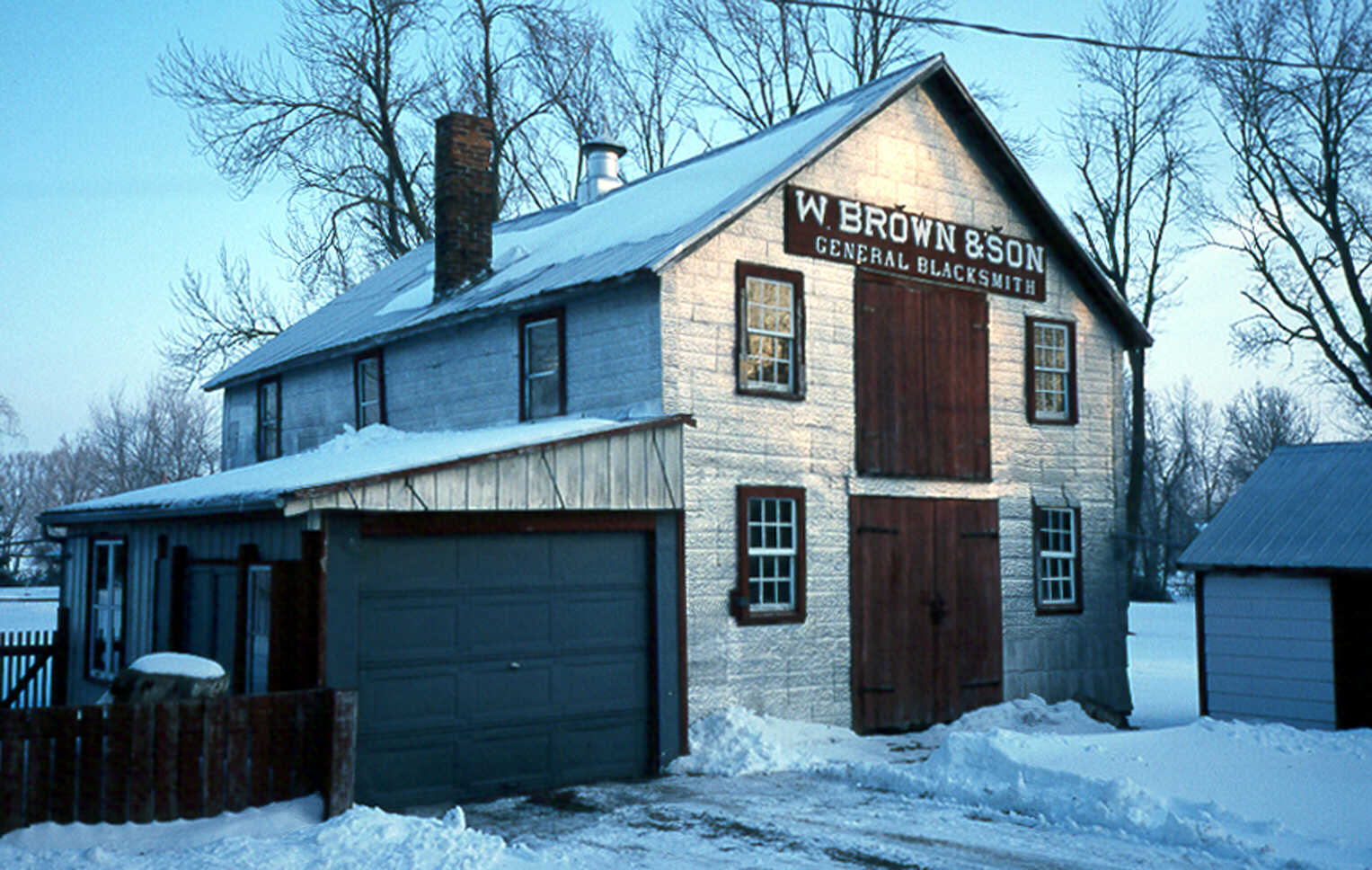 The historic W. Brown and Son blacksmith shop in winter